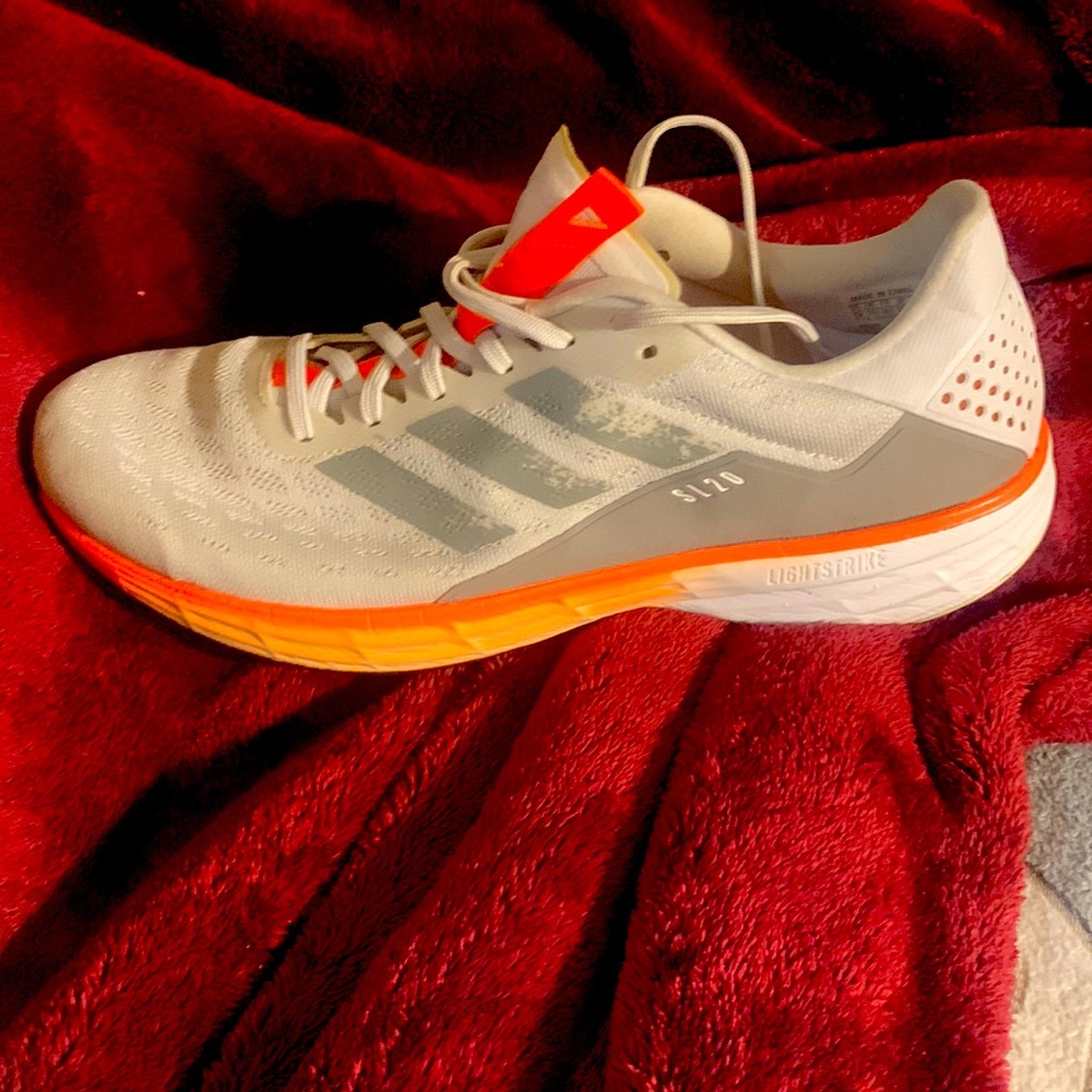 Adidas running shoes.  Great shape. Comfortable. Very clean and little wear.
